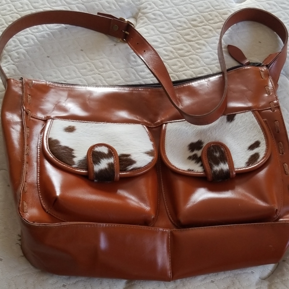 Claudia Roldani cowhide trim shoulder bag